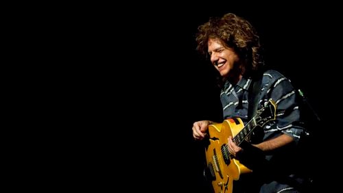American jazz guitarist and composer Pat Metheny performs with his trio at the Budapest Convention Center, Hungary, Friday, Oct. 28, 2011. (AP Photo/MTI, Balazs Mohai)