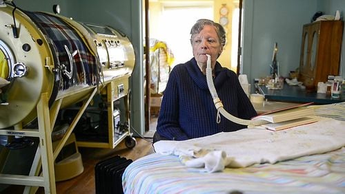 Mona Randolph, 82, uses a respirator during the day to help her breathe. The modern device is not as comfortable for her as the 75-year-old iron lung because it forces air into her lungs, which could be “irritating.” Mona got polio when she was 20 years old and has suffered from post-polio syndrome since her 40s. (Shelly Yang/Kansas City Star/TNS)