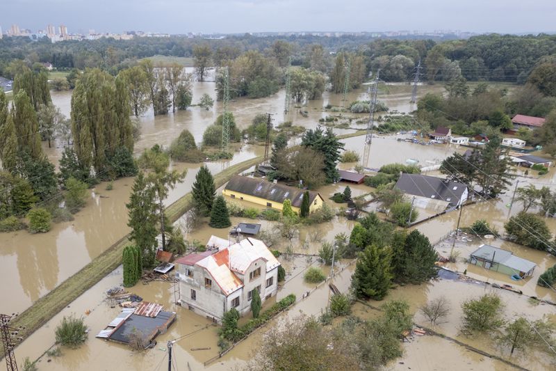 An aerial view of a flooded neighborhood in Ostrava, Czech Republic, Monday, Sept. 16, 2024. (AP Photo/Darko Bandic)