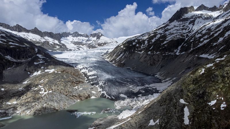 FILE - A lake of meltwater has formed on the tongue of the Rhone Glacier near Goms, Switzerland, June 13, 2023. (AP Photo/Matthias Schrader, File)