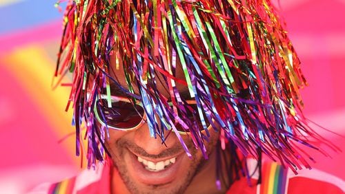 Christian Goodlette sports Pride hair during the Pure Heat Community Festival at Piedmont Park, the signature event of Black Pride Weekend. Photo: Curtis Compton/ccompton@ajc.com