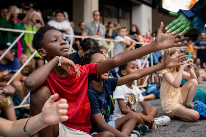 Thousands lined up along Peachtree Street Saturday morning for the annual Dragon Con parade.