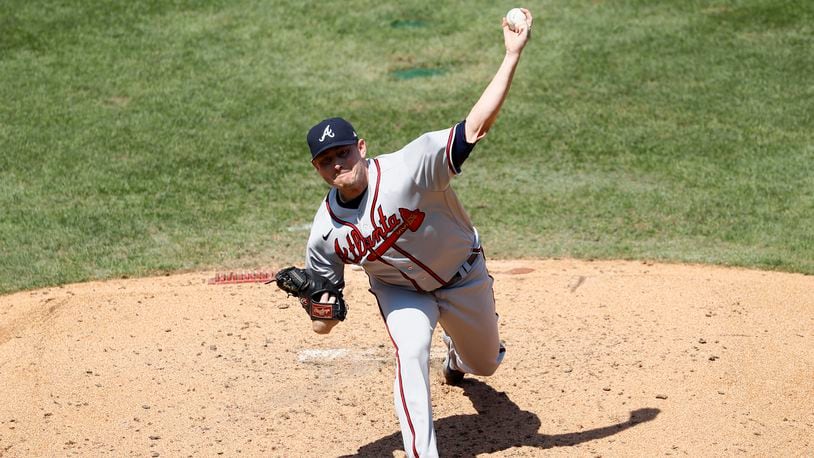 Chipper Jones throws the first pitch of Braves vs Reds game MLB