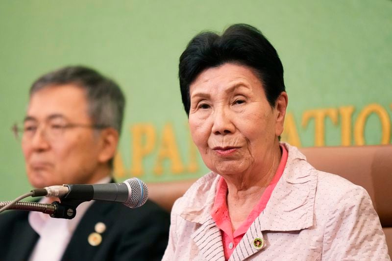 Hideko Hakamada, a sister of Iwao Hakamada, who was recently acquitted by a district court after a retrial for a 1966 quadruple murder, speaks during a news conference in Tokyo, Monday, Sept. 30, 2024. Hideyo Ogawa, lawyer for Iwao Hakamada, sits next to her. (AP Photo/Hiro Komae)