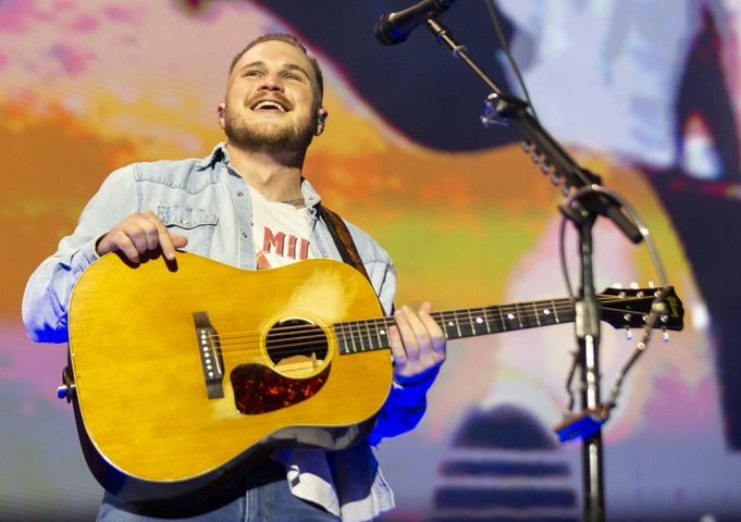 Atlanta, Ga: Zach Bryan played to a sold-out crowd of cowboy hat-clad fans who sang along with every word. Photo taken Saturday August 10, 2024 at Mercedes Benz Sadium. (RYAN FLEISHER FOR THE ATLANTA JOURNAL-CONSTITUTION)