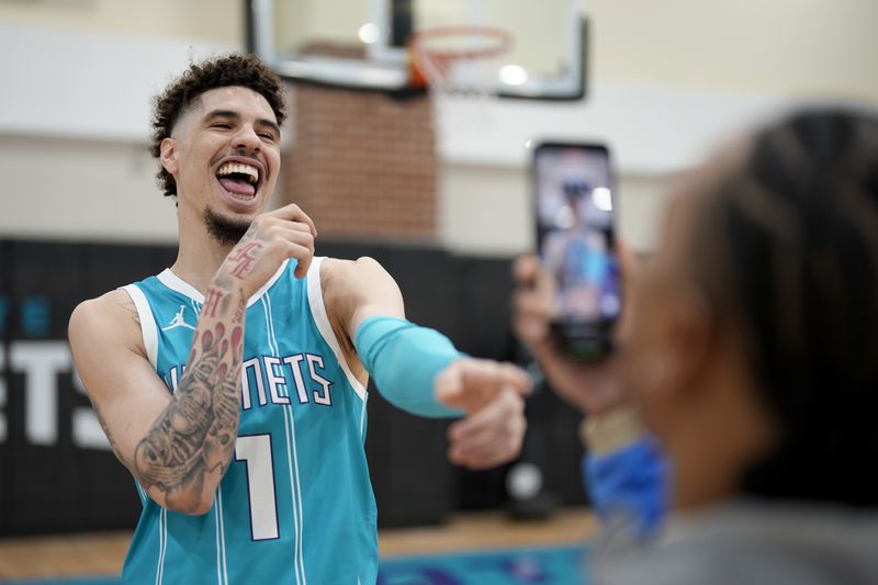 Charlotte Hornets' LaMelo Ball poses during the NBA basketball team's media day, Monday, Sept. 30, 2024, in Charlotte, N.C. (AP Photo/Chris Carlson)