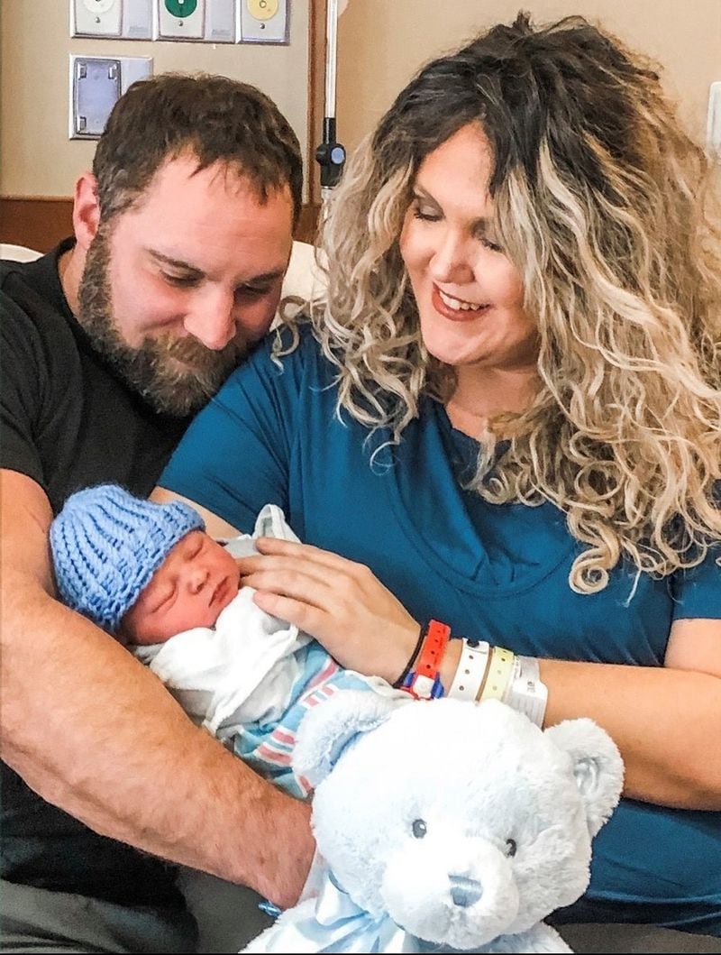 Amanda Hall and Ryan Robins celebrate the birth of their son Luke at WellStar Kennestone Hospital at 12:44 a.m. on Jan. 1, 2020. Luke was one of the first babies born in metro Atlanta in 2020. WELLSTAR KENNESTONE HOSPITAL