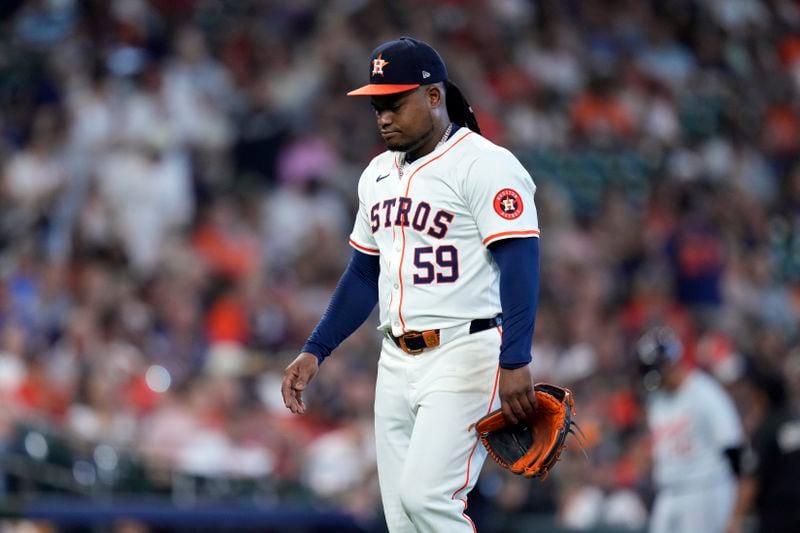 Houston Astros starting pitcher Framber Valdez walks to the dugout after being relieved during the fifth inning of Game 1 of an AL Wild Card Series baseball game against the Detroit Tigers, Tuesday, Oct. 1, 2024, in Houston. (AP Photo/Kevin M. Cox)