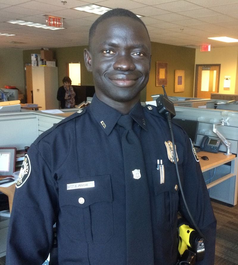 Jacob Mach, a former “Lost Boy of Sudan” who’s an eternal optimist, now wears the Atlanta blue. Photo by Bill Torpy