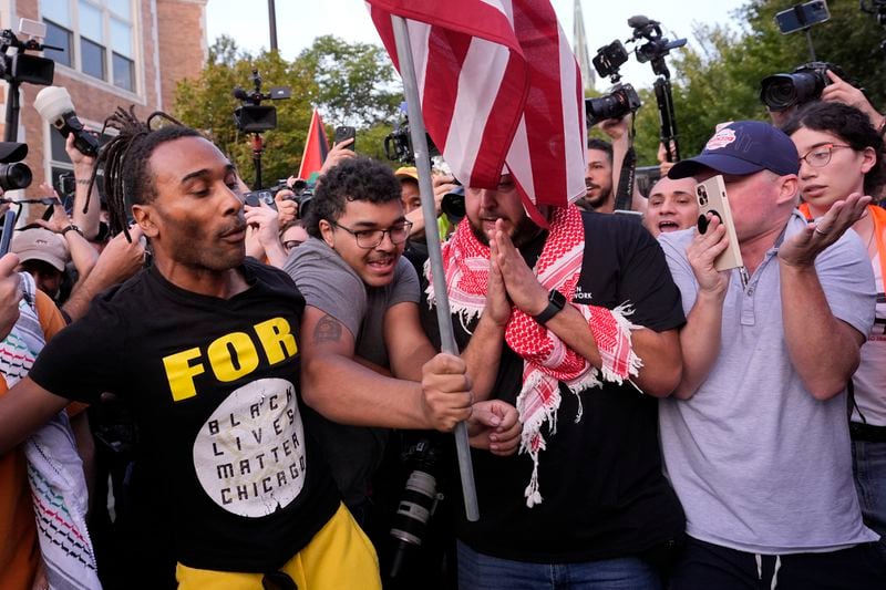 Protesters clash during a march near the Democratic National Convention Thursday, Aug. 22, 2024, in Chicago. (AP Photo/Alex Brandon)