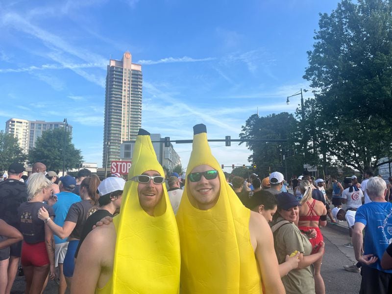 Will Murphy and Matt Antonisse from Marietta dress as bananas for their AJC Peachtree Road Race. Courtesy of Merrill Hart