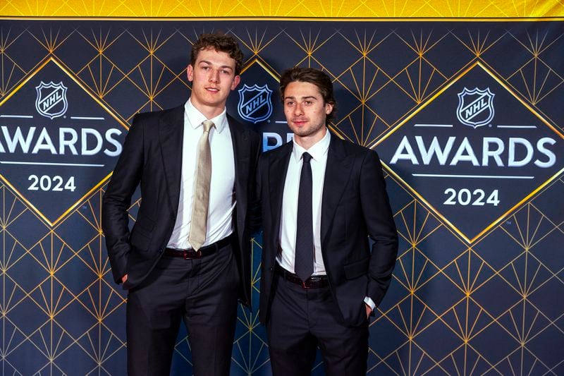 Quinn and Luke Hughes arrive for hockey's NHL Awards, Thursday, June 27, 2024, in Las Vegas. (AP Photo/L.E. Baskow)