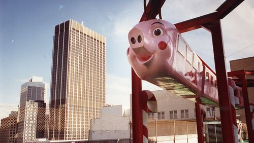 The Pink Pig ride on the roof of Rich's department store in Atlanta on Monday, December 9, 1990. (AJC file photo)
