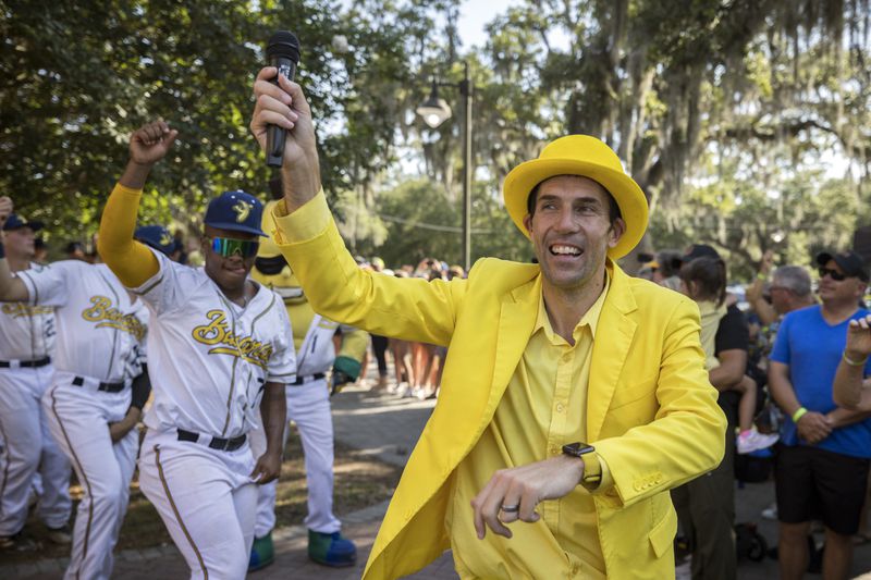 FILE - Savannah Bananas owner Jesse Cole emcees a pregame parade and performance for the fans before the gates open, June 7, 2022, in Savannah, Ga. (AP Photo/Stephen B. Morton, File)