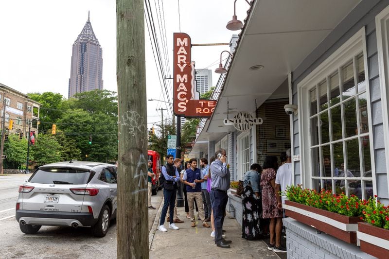 Customers arrive Wednesday for the reopening of Mary Mac's Tea Room.