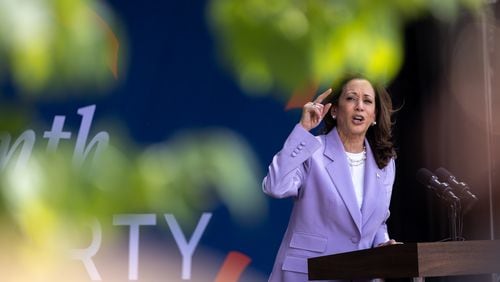 Vice President Kamala Harris speaks at a Juneteenth Block Party campaign event outside her new campaign headquarters in Atlanta on Tuesday, June 18, 2024. (Arvin Temkar / AJC)