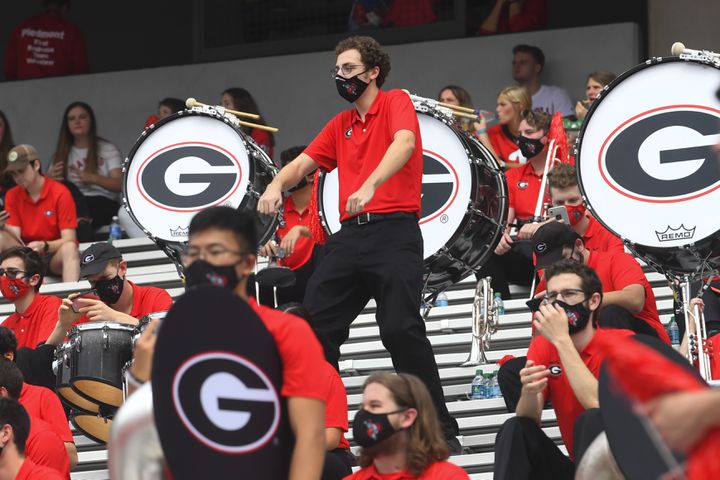 A Georgia band member dances in the stands before a football game against Tennessee, Saturday, Oct. 10, 2020, at Sanford Stadium in Athens. JOHN AMIS FOR THE ATLANTA JOURNAL- CONSTITUTION