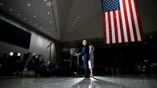 Democratic presidential candidate former Vice President Joe Biden, accompanied by his wife Jill, speaks to members of the press at the National Constitution Center in Philadelphia, Tuesday, March 10, 2020. (AP Photo/Matt Rourke)