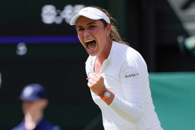 Donna Vekic of Croatia reacts after winning a point against Jasmine Paolini of Italy during their semifinal match at the Wimbledon tennis championships in London, Thursday, July 11, 2024. (AP Photo/Alberto Pezzali)