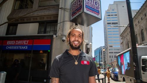 Portrait of Derrick Hayes outside of Big Dave's Cheesesteaks in downtown Atlanta during an event where two Atlanta restauranteurs team up to provide life insurance for Black men. Pinky Cole, CEO and Founder of Slutty Vegan ATL , and D. Hayes, President and CEO of Big Dave's Cheesesteaks, are merging their philanthropic endeavors yet again. The Pinky Cole Foundation and The David & Derrick Hayes Foundation are spearheading Square 1: The Life Experience, a program with an initiative to provide life insurance policies by December 2023 to 25,000 Black men. Eligible participants must be individuals who are between the ages 15-45, earn $30,000 or less annually, and do not use tobacco. 
PHIL SKINNER FOR THE ATLANTA JOURNAL-CONSTITUTION.