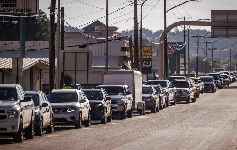 Vehicles line up for re-entry on Highway 70 as full-time residents return to Ruidoso, N.M., Monday, June 24, 2024. (Chancey Bush/The Albuquerque Journal via AP)