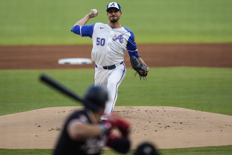 Atlanta Braves pitcher Charlie Morton (50) delivers against Washington Nationals' Juan Yepez (18) in the first inning of a baseball game, Saturday, Aug. 24, 2024, in Atlanta. (AP Photo/Mike Stewart)