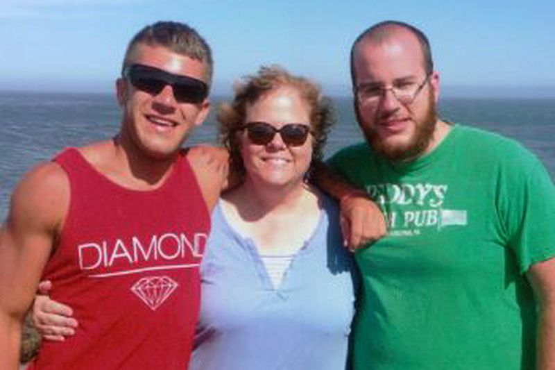 Susan Riffel, center, poses with her sons Melvin, left and Bennett in this undated photo provided by Ike Riffel. Melvin and Bennett Riffel died in the 2019 crash of Boeing 737 Max plane in Ethiopia. Their father Ike Riffel fears that instead of putting Boeing on trial, the U.S. government will offer the company another shot at corporate probation through a legal document called a deferred prosecution agreement, or DPA. (Photo by Ike Riffel via AP)
