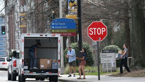 Georgia Tech students load a truck on campus on Saturday, March 14, 2020. Students had to leave the campus for the remainder of the semester.