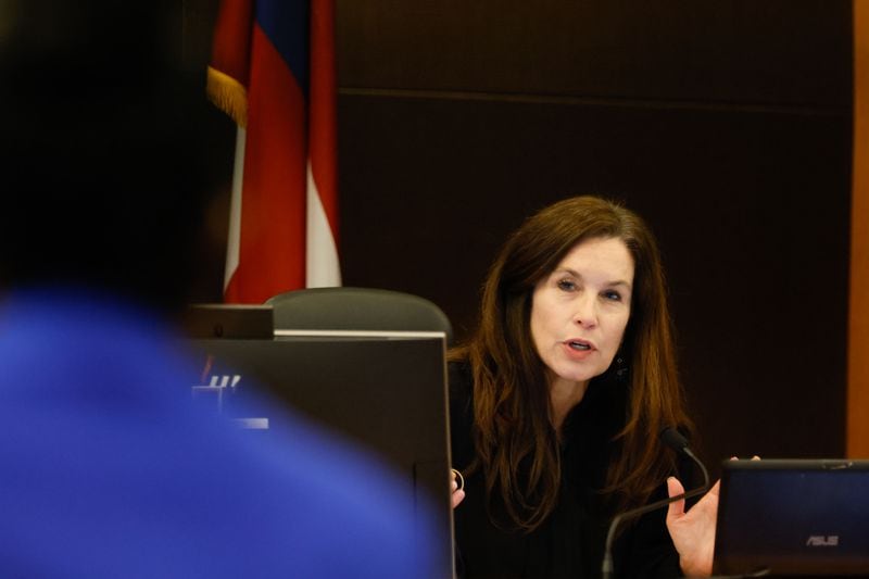 Judge Paige Reese Whitaker answers a question from prosecutor Simone Hylton as she hears arguments for several motions in the YSL trial on Tuesday, July 30, 2024. 
(Miguel Martinez / AJC)