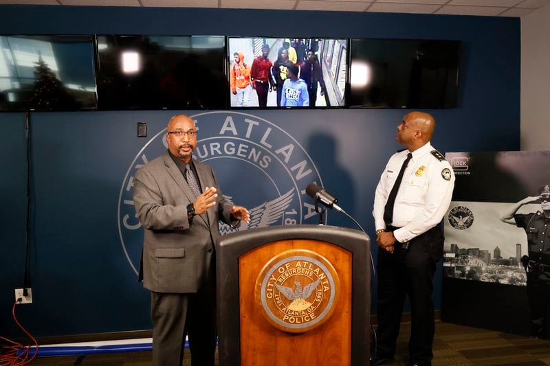 Detective Jarion Shephard and Atlanta Deputy Chief Charles Hampton Jr. speak during a press conference Wednesday. According to investigators, a second child died following a shooting on the 17th Street bridge. Miguel Martinez / miguel.martinezjimenez@ajc.com