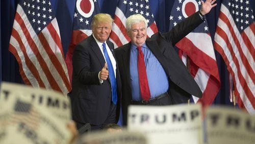 Republican presidential candidate Donald Trump, left, and former House Speaker Newt Gingrich, right, acknowledge the crowd during a campaign rally at the Sharonville Convention Center, Wednesday, July 6, 2016, in Cincinnati. (AP Photo/John Minchillo)