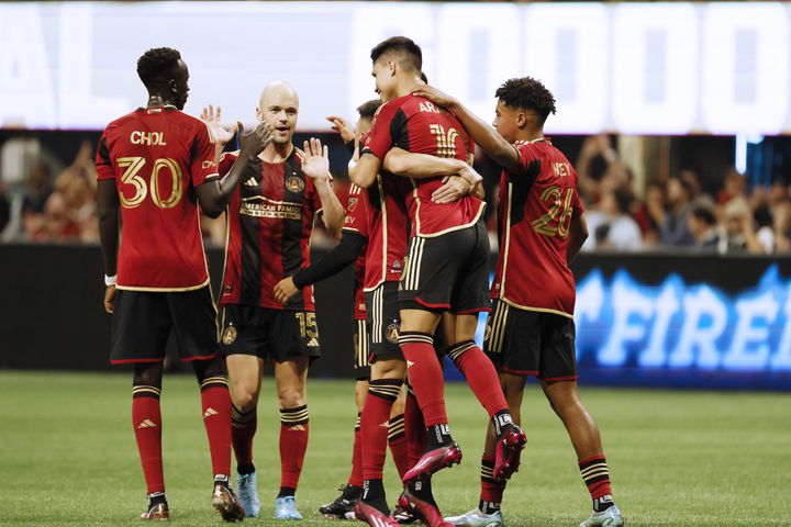 Atlanta United players celebrate with forward  Luis Araújo (10) after he scored a goal during the first half against Liga MX Toluca of an exhibition match on Wednesday, Feb 15, 2023, in Atlanta.  Miguel Martinez / miguel.martinezjimenez@ajc.com