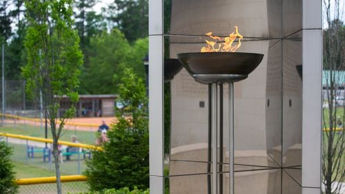 The eternal flame is shown in the Besser Holocaust Memorial Garden overlooking the baseball fields at the Marcus Jewish Community Center Tuesday, May 12, 2015, in Dunwoody. AJC FILE PHOTO