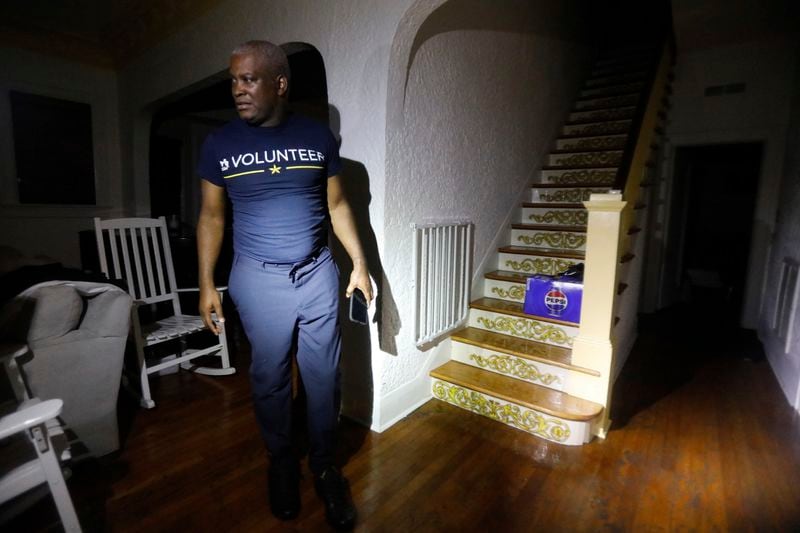 Andrew Lucky, 54, speaks about the water damage to his house caused by a flood from Hurricane Helene near DeSoto Park, Fla., on Friday, Sept. 27, 2024, in Tampa. (Jefferee Woo/Tampa Bay Times via AP)