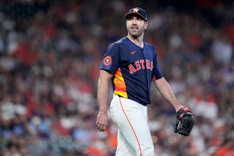 Houston Astros starting pitcher Justin Verlander reacts after giving up a grand slam to Arizona Diamondbacks' Pavin Smith during the third inning of a baseball game Sunday, Sept. 8, 2024, in Houston. (AP Photo/Eric Christian Smith)