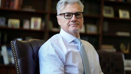 FILE - Judge Juan M. Merchan poses in his chambers in New York, March 14, 2024. (AP Photo/Seth Wenig, File)