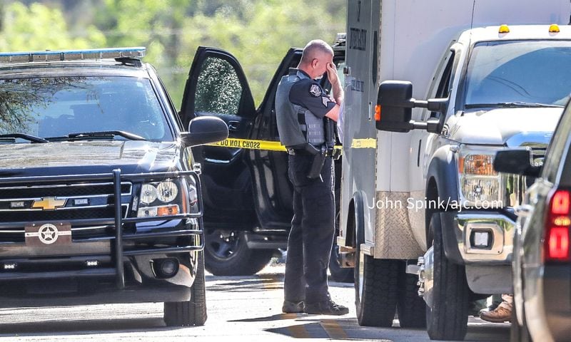 3 officers injured, suspect dead after chase, shooting in Carroll County