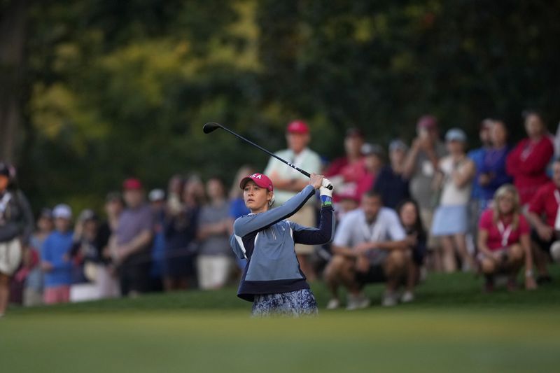 United States' Nelly Korda hits from the first fairway during a Solheim Cup golf tournament foursome match at Robert Trent Jones Golf Club, Saturday, Sept. 14, 2024, in Gainesville, Va. (AP Photo/Matt York)