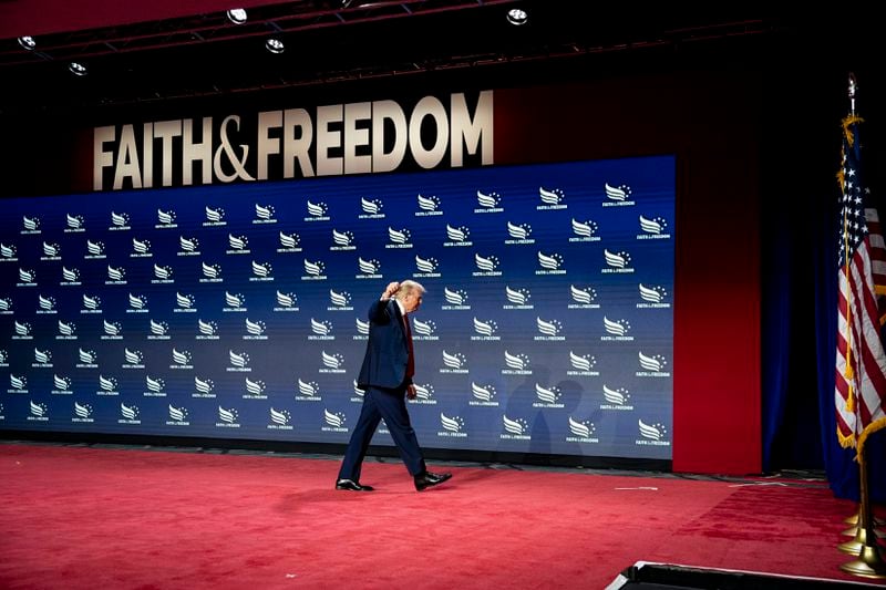 Former president Donald Trump leaves the Faith & Freedom Coalition conference in Washington after speaking on Saturday.