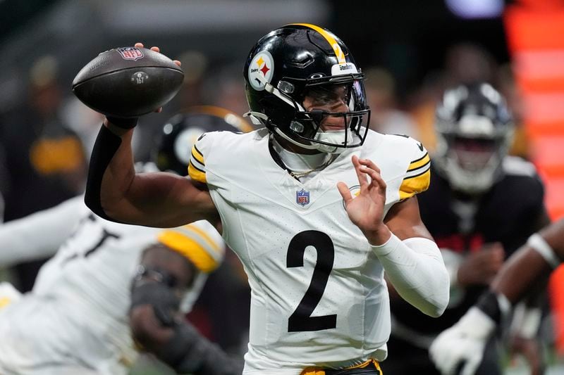 Pittsburgh Steelers quarterback Justin Fields looks to pass during the first half of an NFL football game against the Atlanta Falcons on Sunday, Sept. 8, 2024, in Atlanta. (AP Photo/John Bazemore)