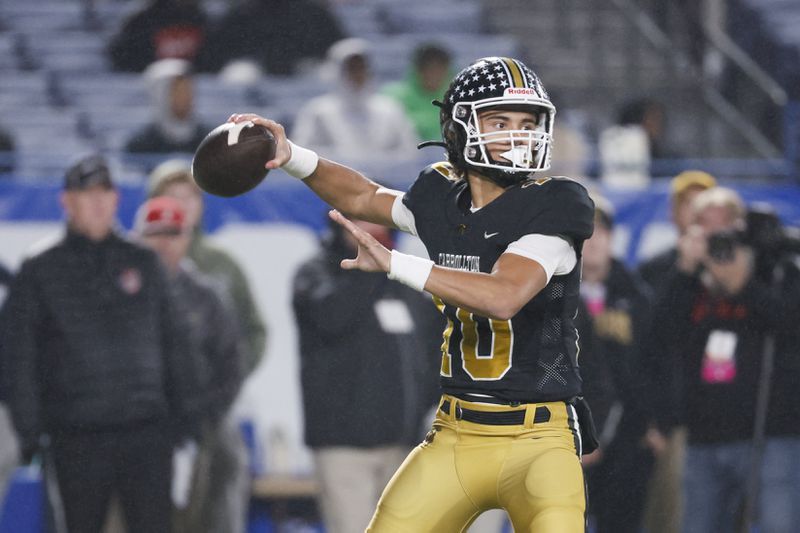 Carrollton quarterback Julian Lewis (10) attempts a pass during the first half against Mill Creek in the GHSA Class 7A finals, at Center Parc Stadium, Saturday, December 10, 2022, in Atlanta. Mill Creek defeated Carrollton 70-35. Carrollton freshman quarterback Julian Lewis threw for a state championship game record 531 yards and five touchdowns. (Jason Getz / Jason.Getz@ajc.com)