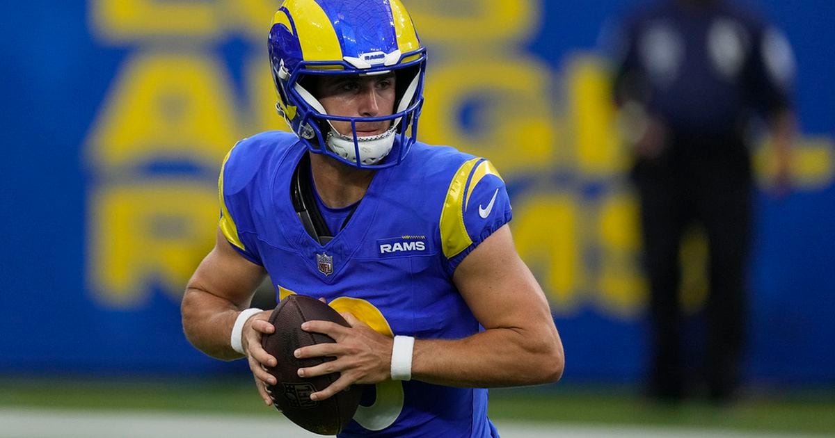 Quarterback Stetson Bennett of the Los Angeles Rams throws a pass