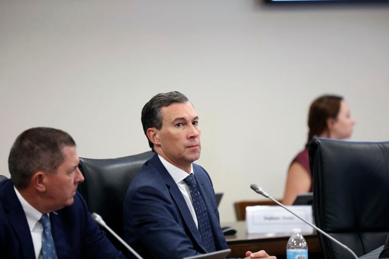 Duke Energy's utility operations in South Carolina President Mike Callahan waits to testify before a South Carolina Senate committee planning to write a comprehensive energy bill in 2025 in Columbia, S.C., on Thursday, Aug. 22 2024. (AP Photo/Jeffrey Collins)