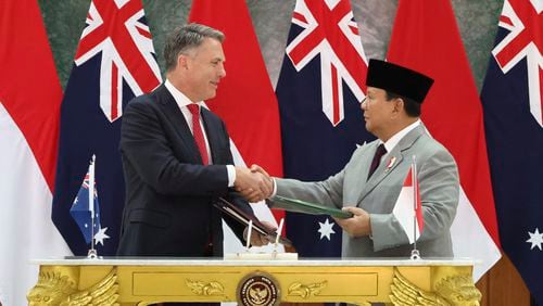 In this photo released by Indonesia's Ministry of Defense, Australia's Deputy Prime Minister and Defense Minister Richard Marles, left, shakes hands with Indonesian Defense Minister Prabowo Subianto during their meeting at the Military Academy in Magelang, Central Java, Indonesia, Thursday, Aug. 29, 2024. (Indonesian Ministry of Defense via AP)