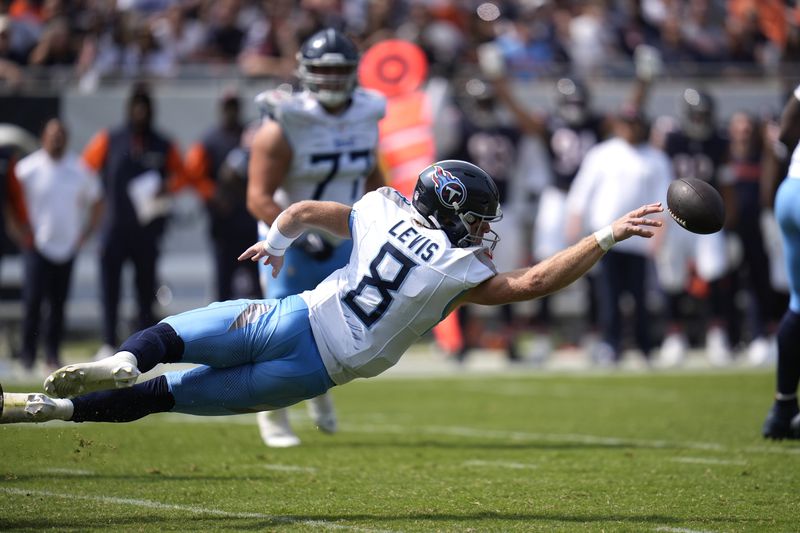 Tennessee Titans quarterback Will Levis stretches out and throws an incomplete pass during the second half of an NFL football game against the Chicago Bears on Sunday, Sept. 8, 2024, in Chicago. (AP Photo/Erin Hooley)