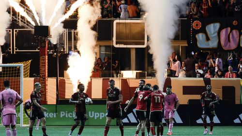 Atlanta United players celebrate after midfielder Alexey Miranchuk scores during the second half of an MLS soccer match against Inter Miami, Wednesday, Sept. 18, 2024, in Atlanta. (Miguel Martinez/Atlanta Journal-Constitution via AP)