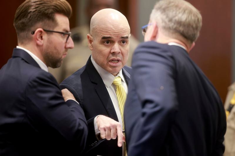 Robert Telles talks to his attorneys Michael Horvath, left, and Robert Draskovich in the courtroom during a break in proceedings on the fourth day of his murder trial at the Regional Justice Center in Las Vegas Thursday, August 15, 2024. Telles, a former Clark County public administrator, is charged in the murder of Las Vegas Review-Journal investigative journalist Jeff German and has pleaded not guilty. (K.M. Cannon/Las Vegas Review-Journal via AP, Pool)