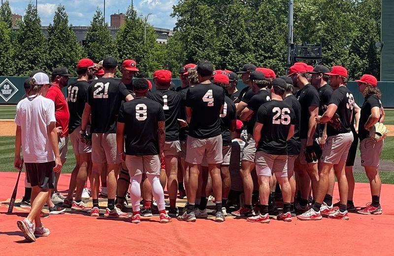 Georgia baseball players and coaches gather on the mound at Foley Field on Friday at the end of their 90-minute practice in advance of Saturday's NCAA Athens Super Regional. (Photo by Chip Towers/ctowers@ajc.com)