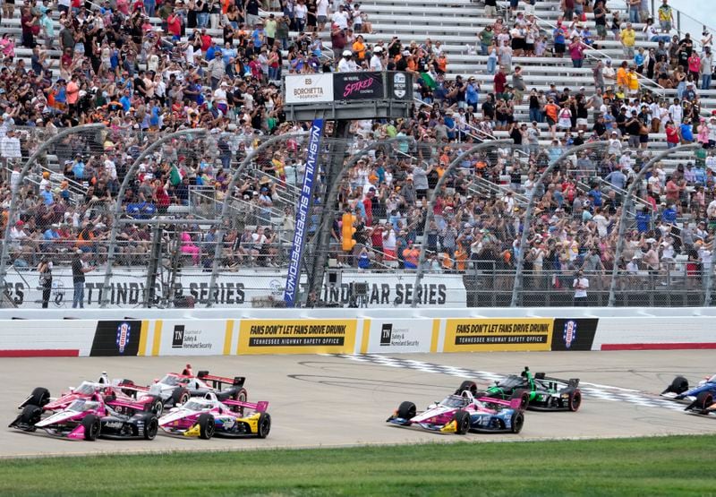 Drives pass under the green flag as they start an IndyCar auto race Sunday, Sept. 15, 2024, at Nashville Superspeedway in Lebanon, Tenn. (AP Photo/Mark Humphrey)