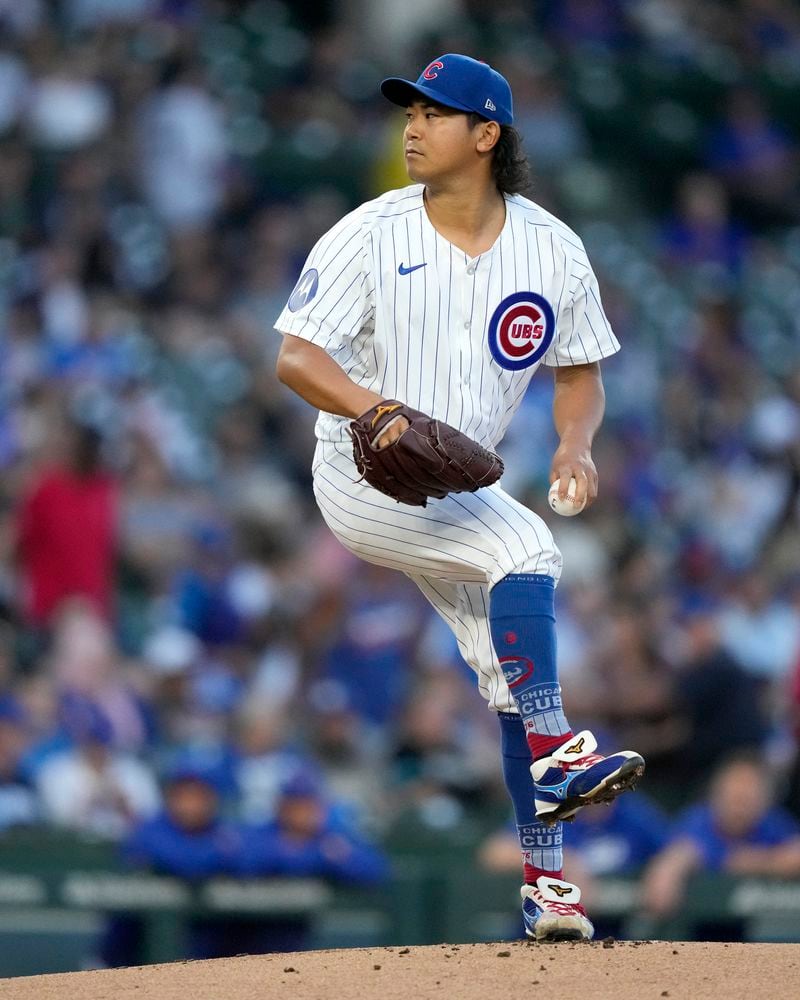 Chicago Cubs pitcher Shota Imanaga winds up during the first inning of a baseball game against the Pittsburgh Pirates, Wednesday, Sept. 4, 2024, in Chicago. (AP Photo/Charles Rex Arbogast)